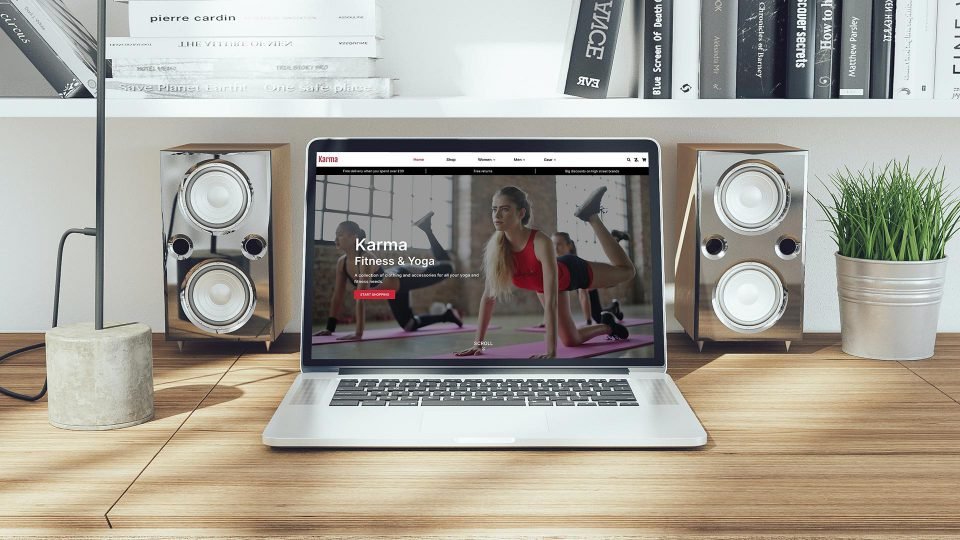 karma fitness website on macbook screen